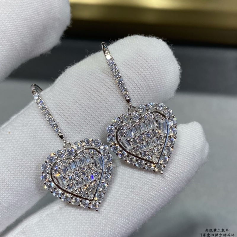 T*f*ny earrings